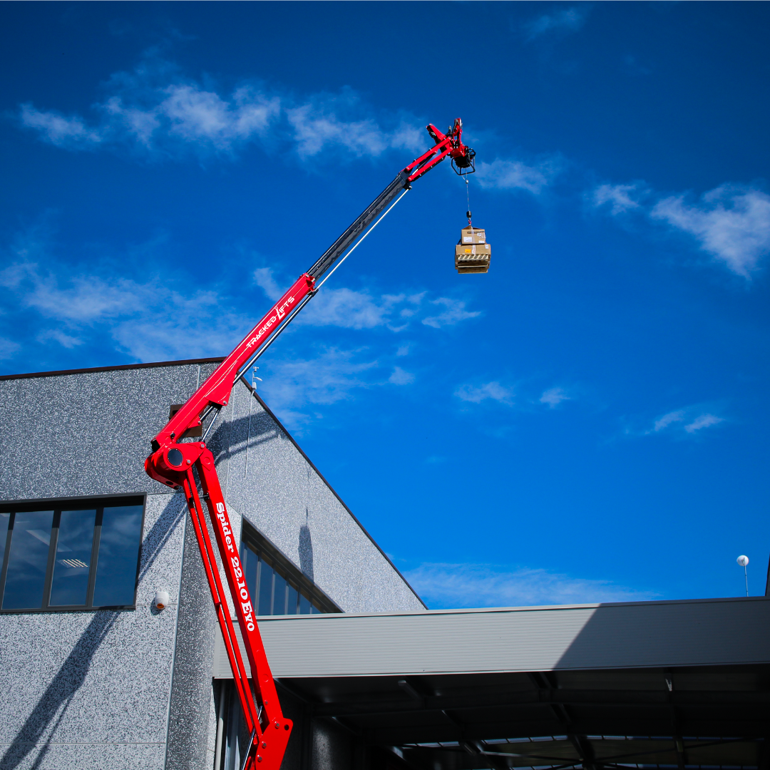 Tracked Lift 22.10 EVO being used over a building